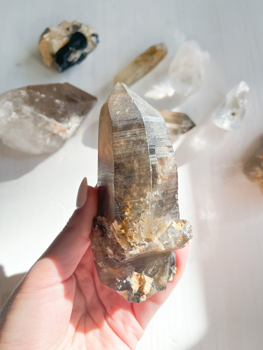 77 raw Smokey Quartz point
